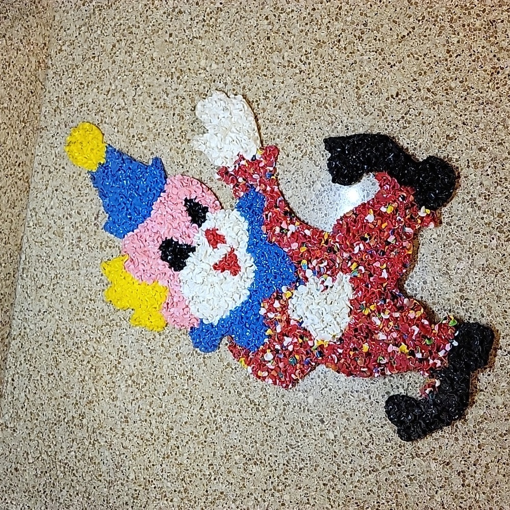 Vintage 70's melted plastic popcorn circus clown.
